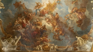 Een close-up van een barokke plafondmuur in Versailles. (Foto door Tiffany Yu)